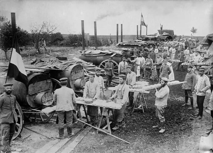 Framed Print : World War 1. German field bakery with soldiers cooking bread in mobile ovens near Ypres, Belgium during World War I. 1914