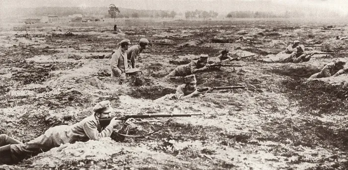 Framed Print : World War 1 Polish Infantry of the German Army in East Prussia in 1914. They are on flat ground firing from individual rifle pits. (BSLOC_2012_4_8)