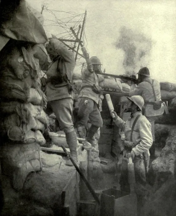 Framed Print : World War 1. Somme Offensive. Two French soldiers hurling bombs (grenades) over the trench parapet, while a third hands them up as required