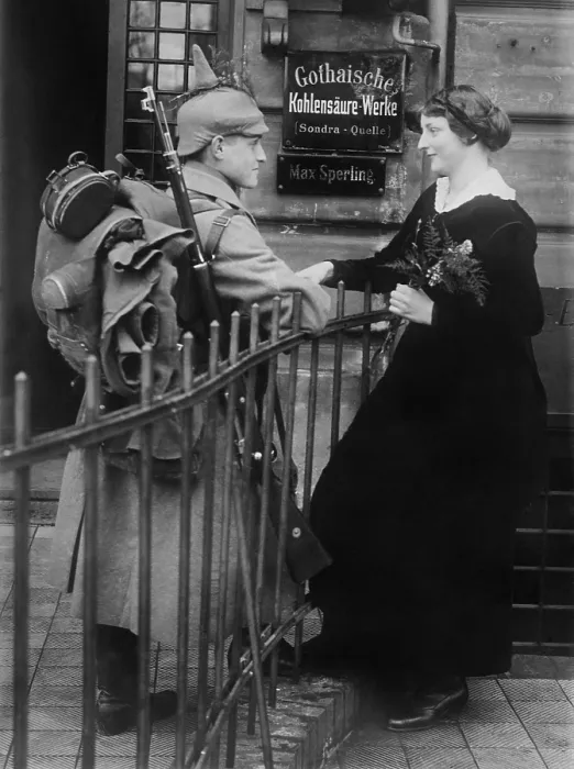 Framed Print : World War 1. Young German couple saying goodbye. The soldier wears his uniform with full gear including his backpack and rifle. Ca. 1914 Framed Print : World War 1. Young German couple saying goodbye. The soldier wears his uniform with full gear including his backpack and rifle. Ca. 1914