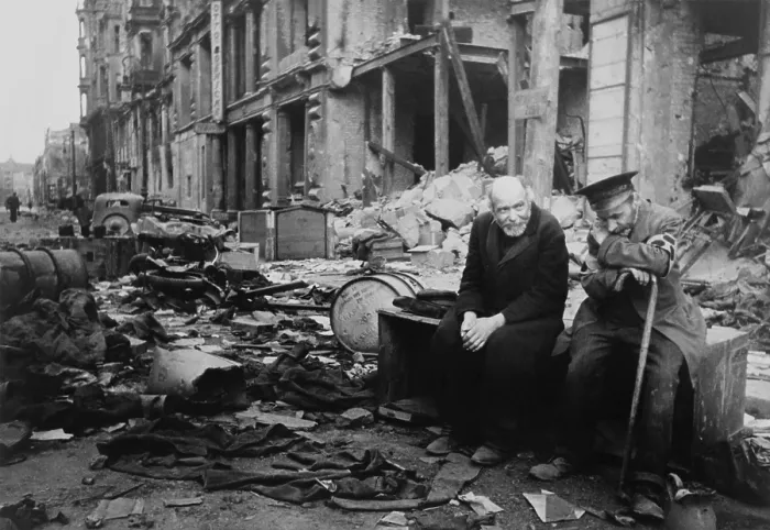 Framed Print : World War 2, Battle of Berlin, May 1945. Two elderly German men, one wearing the armband signifying blindness, the other his helper, sitting on a crate amid the rubble