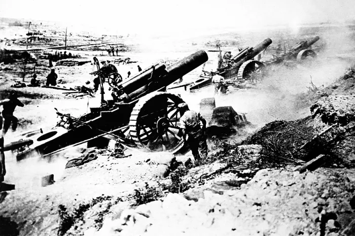 Framed Print : World War I British guns in an elevated position fire toward at the battle front. 1914-1918