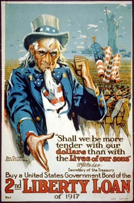 Framed Print : World War I, Poster showing Uncle Sam gesturing towards troops, ships, and planes around the Statue of Liberty, 1917