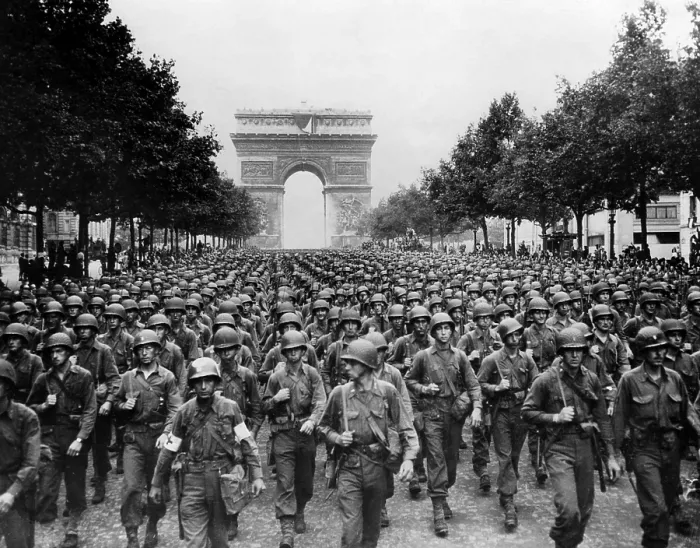 Framed Print : World War II: American troops marching down the Champs Elysees celebrating liberation in Paris, France, September 1944.. Courtesy: CSU Archives / Everett Collection Framed Print : World War II: American troops marching down the Champs Elysees celebrating liberation in Paris, France, September 1944.. Courtesy: CSU Archives / Everett Collection
