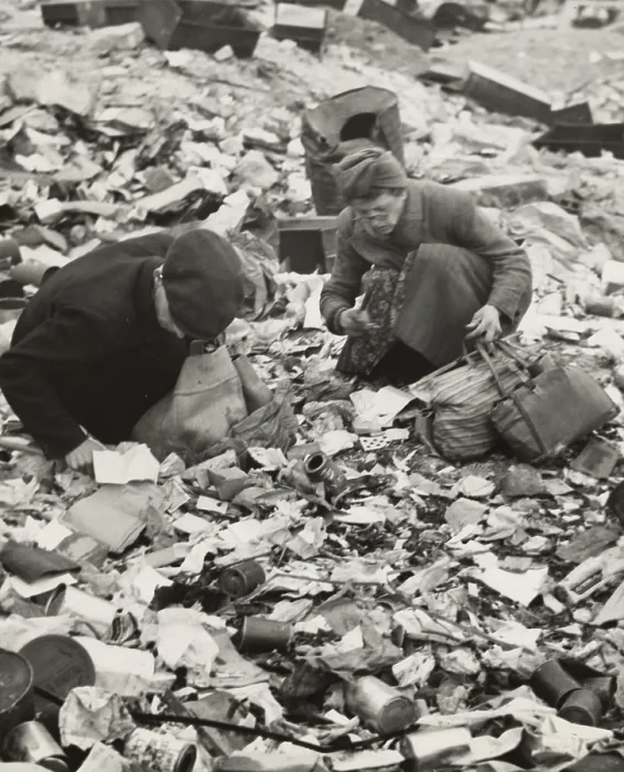 Framed Print : World War II, two Germans searching for food in a garbage dump, original caption: Hunger, the price of defeat, Berlin, Germany, photograph by Emil Reynolds, 1945