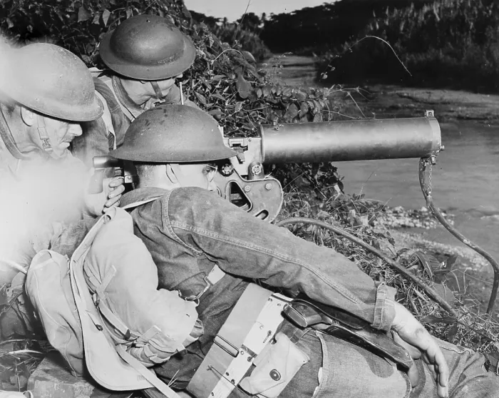 Framed Print : World War II, a machine gun crew of American troops in the British West Indies, gaurding a strategic point along a river during the course of maneuvers, circa 1942 Framed Print : World War II, a machine gun crew of American troops in the British West Indies, gaurding a strategic point along a river during the course of maneuvers, circa 1942