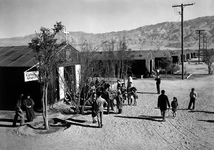 Framed Print : World War II, People standing outside Catholic church at Manzanar Relocation Center, California. photograph by Ansel Adams. 1943 Framed Print : World War II, People standing outside Catholic church at Manzanar Relocation Center, California. photograph by Ansel Adams. 1943