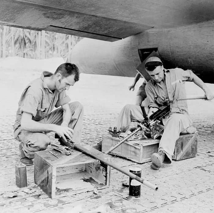 Framed Print : World War II, Sergeant Edward T. Spetch, Sergeant Vernon Nelson, Flying Fortress gunners carefully clean their.50 caliber machine guns at a U.S