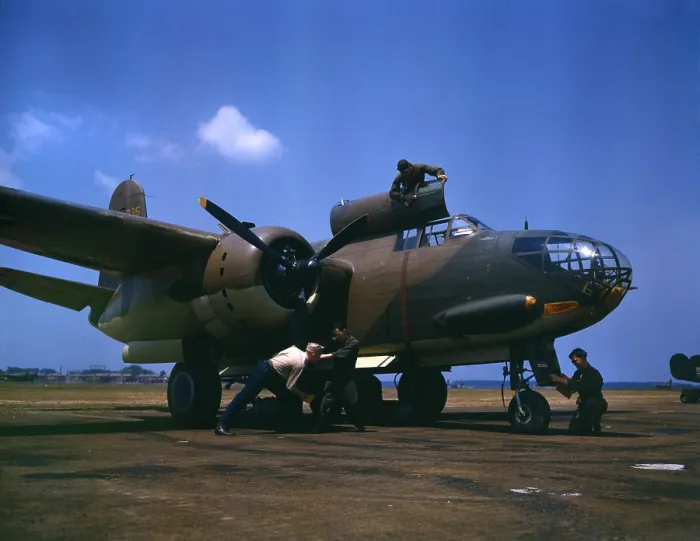 Framed Print : World War II, servicing an A-20 bomber, photograph by Alfred T. Palmer, Langley Field, Viginia, July, 1942