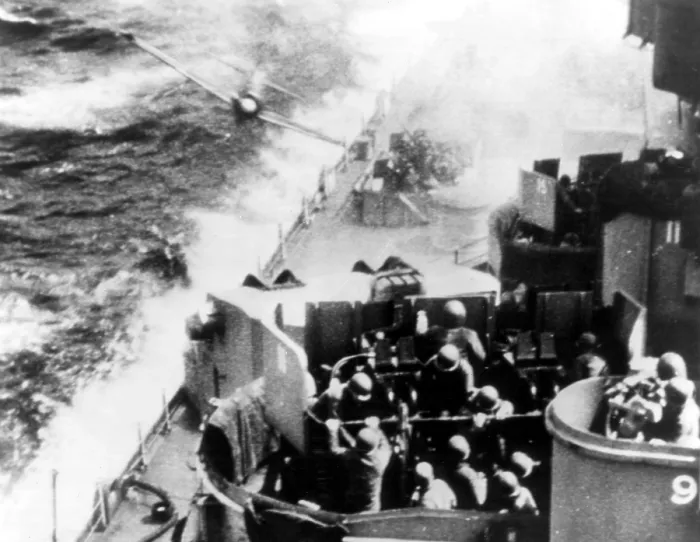 Framed Print : World War II: Suicide-bent, this pilot of a Japanese Zeke plane desperately tries to crash into the deck of U.S. Pacific Fleet warship Framed Print : World War II: Suicide-bent, this pilot of a Japanese Zeke plane desperately tries to crash into the deck of U.S. Pacific Fleet warship