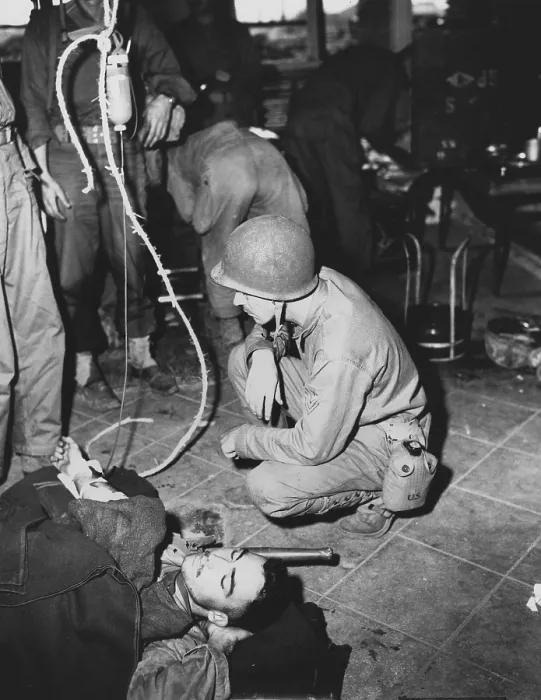 Framed Print : A wounded Marine is given whole blood by a medic at Yellow Beach Inchon, Korea. Sept. 17, 1950. After Korean War, 1950-53. (BSLOC_2014_11_48) Framed Print : A wounded Marine is given whole blood by a medic at Yellow Beach Inchon, Korea. Sept. 17, 1950. After Korean War, 1950-53. (BSLOC_2014_11_48)