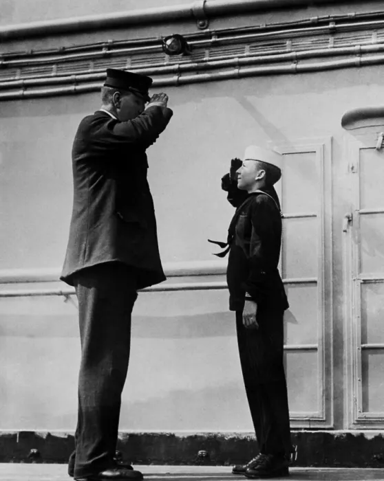 Framed Print : On the WW1 troop ship, USS Leviathan, the ships tallest and shortest sailor salute each other. The taller is the Chief Machinists Mate (BSLOC_2017_1_17)