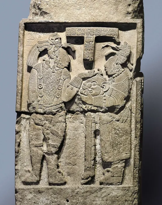 Framed Print : Yaxchiln Lintel 26. 726. Late Classical Period. Cult scene with a woman delivering a jaguar head or a mask to a dignitary or priest. Maya art. Relief on rock. MEXICO. Mexico City