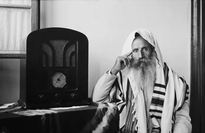 Framed Print : Yemenite Rabbi, in traditional robes and prayer shawl, listening to radio, ca. 1937