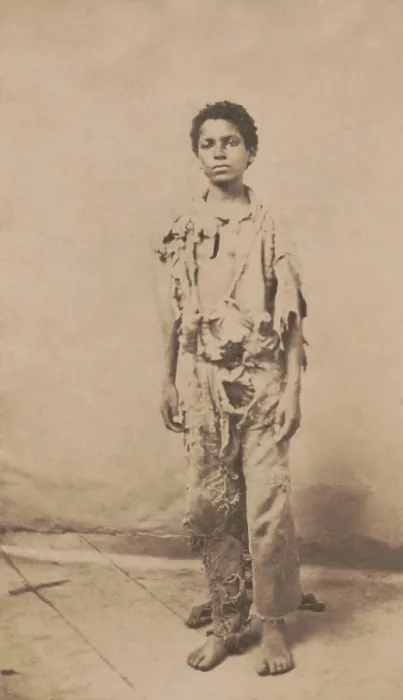 Framed Print : Young African American refugee, wearing rags from his place of enslavement in Louisiana. This photo was taken before he became a drummer boy