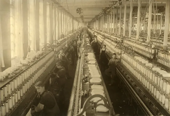 Framed Print : Young boys and girls working in the spinning room of the Cornell Mill in Fall River, Massachusetts. January 1912 photo by Lewis Hine