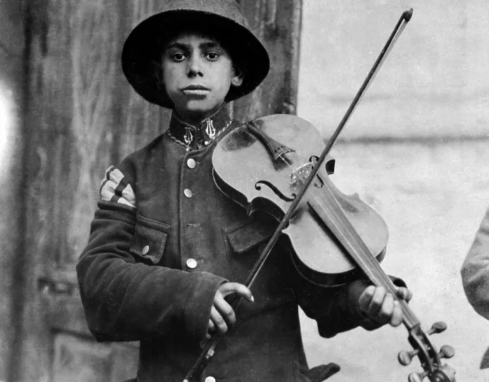 Framed Print : A young Christmas street fiddler, Belgrade, Serbia. Photo by Lewis Hine. Dec. 1918 Framed Print : A young Christmas street fiddler, Belgrade, Serbia. Photo by Lewis Hine. Dec. 1918