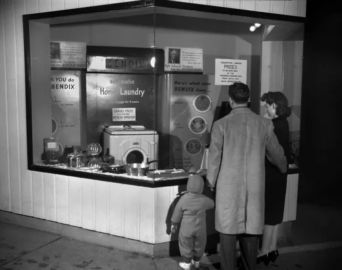 Framed Print : Young family look at the Bendix Automatic Home Laundry. It will be given away by the Elks Club at the President's Birthday Ball for March of Dimes. Oak Ridge, Tennessee Framed Print : Young family look at the Bendix Automatic Home Laundry. It will be given away by the Elks Club at the President's Birthday Ball for March of Dimes. Oak Ridge, Tennessee