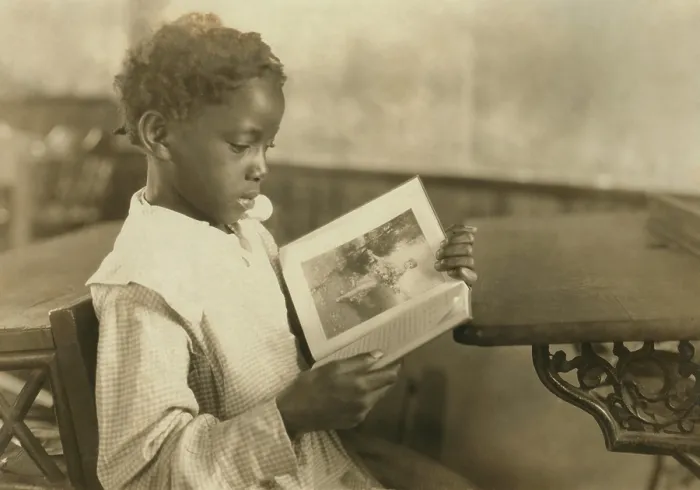 Framed Print : Young girl reading an illustrated book in Pleasant Green School, near Marlinton, West Virginia Framed Print : Young girl reading an illustrated book in Pleasant Green School, near Marlinton, West Virginia