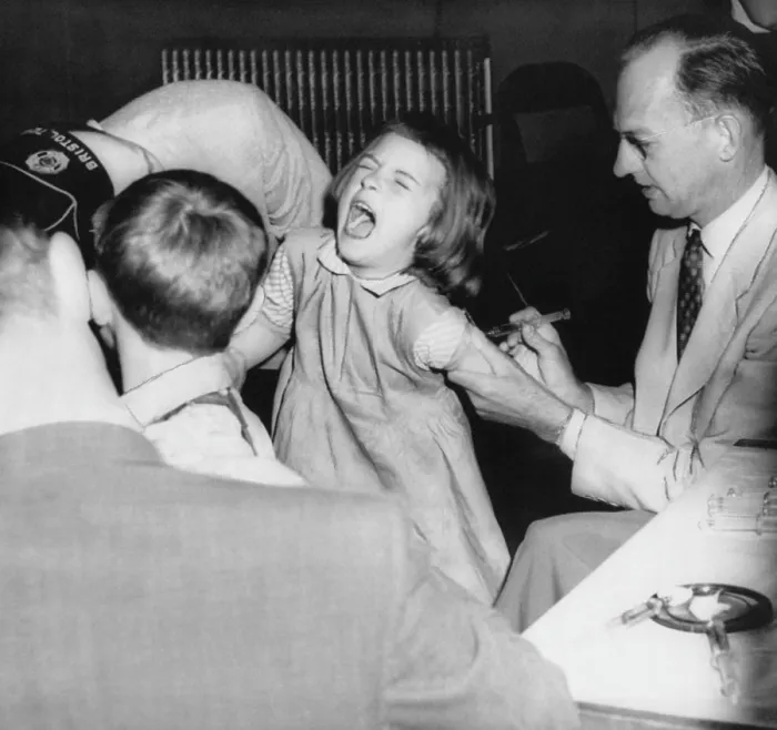 Framed Print : A young girl receiving a vaccine from Dr. Hugh Griffin (right), circa 1950s. Courtesy: CSU Archives / Everett Collection Framed Print : A young girl receiving a vaccine from Dr. Hugh Griffin (right), circa 1950s. Courtesy: CSU Archives / Everett Collection