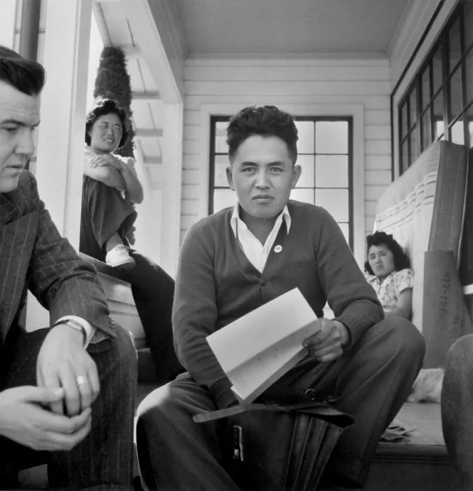 Framed Print : Young Japanese American celery grower holds documents to will lease his farm. He will interned or enlist in the Armed Forces until the end of World War 2