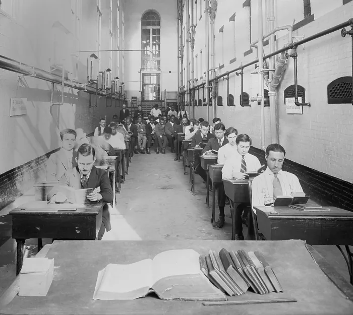 Framed Print : Young men at desks in an American jail c. 1920 Framed Print : Young men at desks in an American jail c. 1920