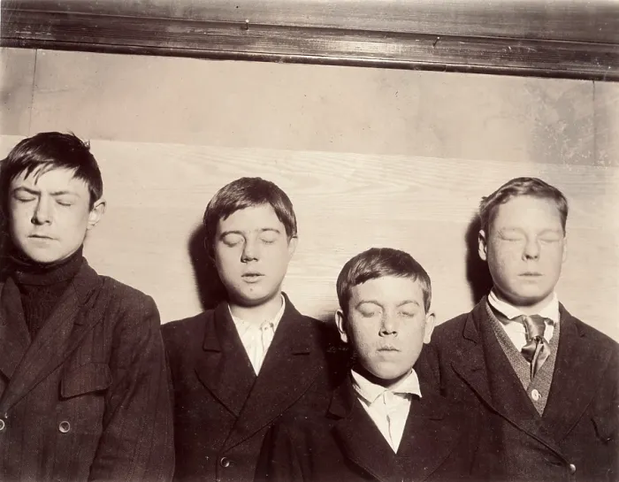 Framed Print : Four young men with eyes closed, original caption: Four incorrigibles not even reached by the Vocational School, Buffalo, New York, photograph by Lewis Wickes Hine