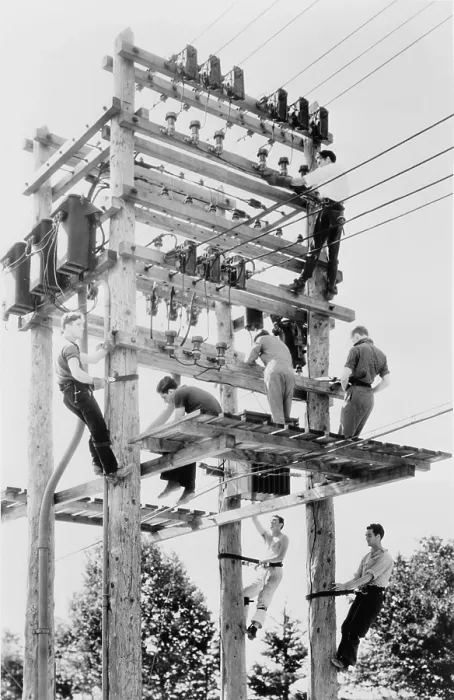 Framed Print : Young men working on telephone poles in Maine. National Youth Administration provided vocational training under the New Deal. 1939