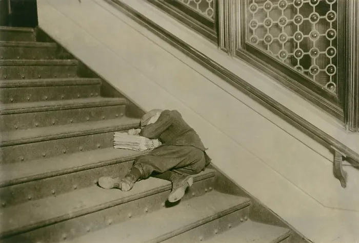 Framed Print : Very young newsboy sleeps on stairs with papers, Jersey City, New Jersey, Feb. 1912