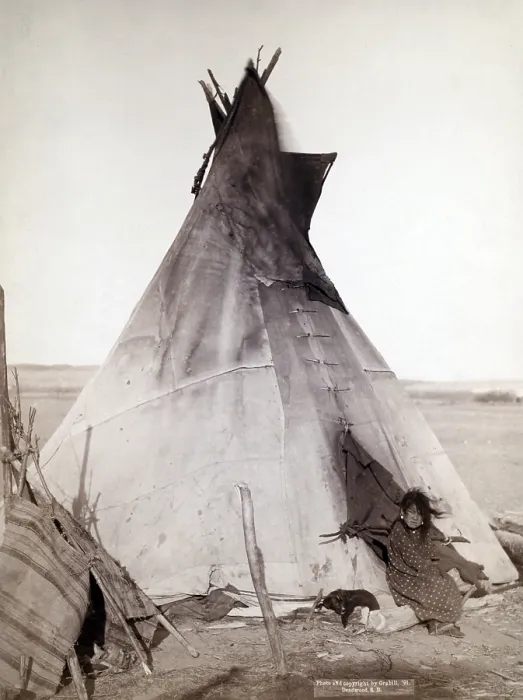 Framed Print : A young Oglala girl sitting in front of a tipi, with a puppy beside her, probably on or near Pine Ridge Reservation. Pine Ridge, South Dakota. Photo by John C. Grabill. 1891 Framed Print : A young Oglala girl sitting in front of a tipi, with a puppy beside her, probably on or near Pine Ridge Reservation. Pine Ridge, South Dakota. Photo by John C. Grabill. 1891