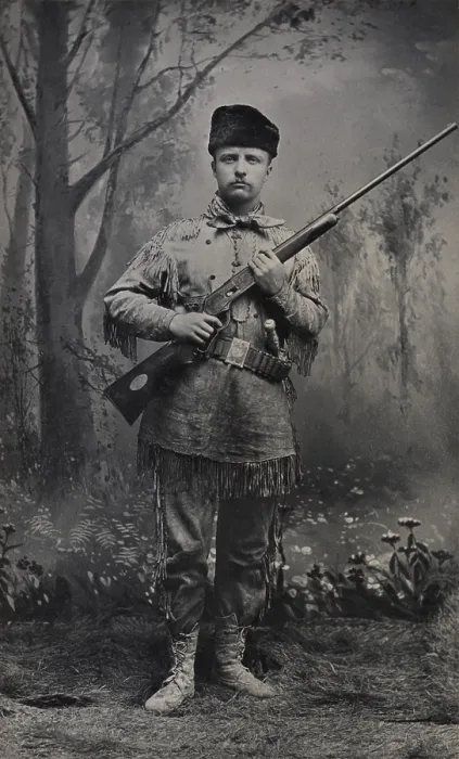 Framed Print : Young Theodore Roosevelt dressed in deer skins posing with a rifle in an 1885 studio portrait Framed Print : Young Theodore Roosevelt dressed in deer skins posing with a rifle in an 1885 studio portrait