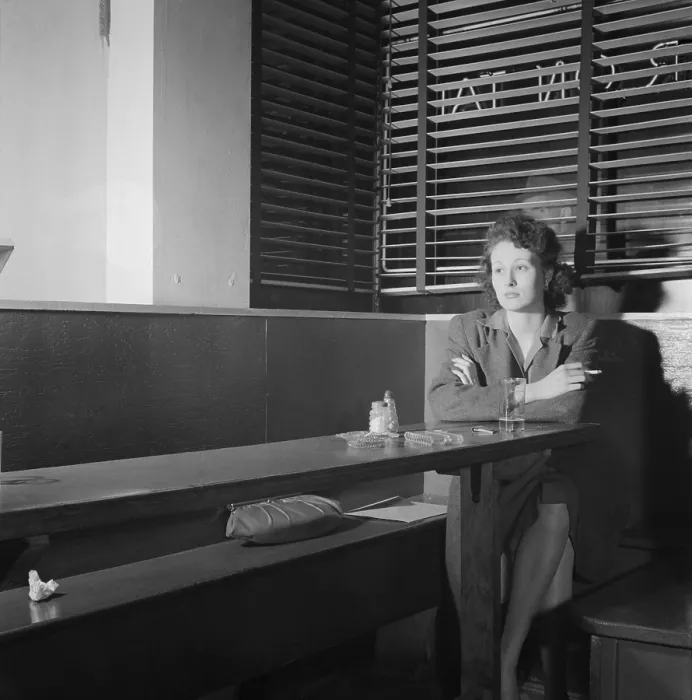 Framed Print : Young woman sitting alone in a Washington, D.C. bar, April 1943. She came to the Sea Grill pretty often, hoping to meet a nice lonesome soldiers