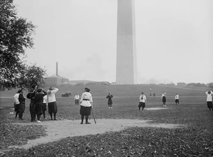 Framed Print : Young women in bloomers and middy shirts playing baseball on the National Mall. Oct 19, 1919. Washington, D.C. (BSLOC_2015_16_237)