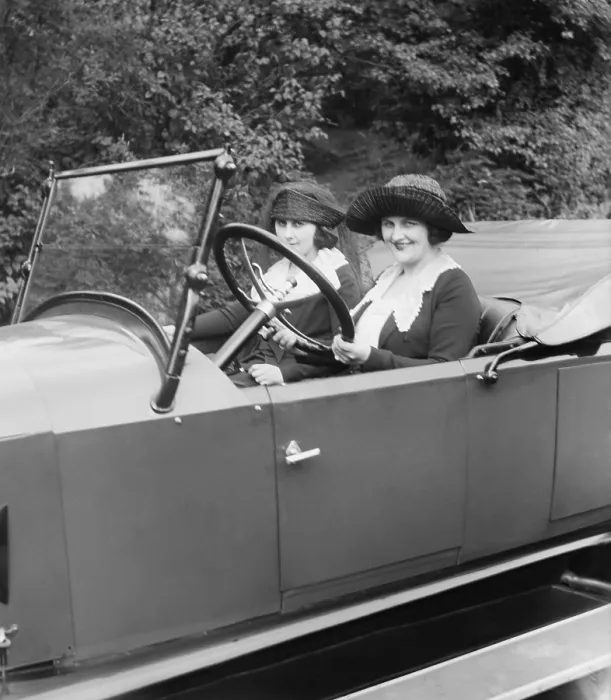 Framed Print : Young women driving a convertible in Washington, D.C. Ca. 1920. (BSLOC_2015_16_233)