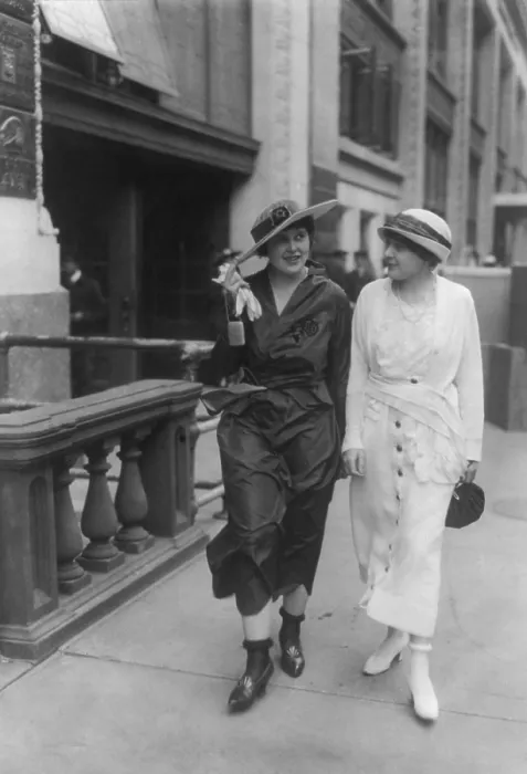 Framed Print : Two young women wearing their stockings rolled above their ankles, ca. 1922-24 Framed Print : Two young women wearing their stockings rolled above their ankles, ca. 1922-24