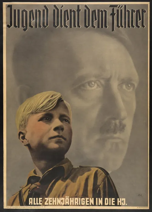 Framed Print : Youth serves the leader - all ten year-olds into the Hitler Youth'. Poster shows German boy wearing Hitler Youth uniform, with portrait of Adolf Hitler behind him. 1941