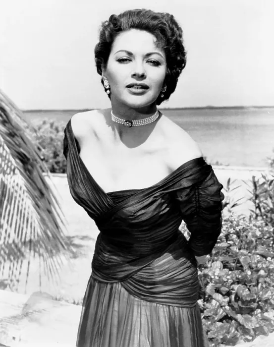Framed Print : Yvonne De Carlo, on location in Nassau, where she is filming FLAME OF THE ISLANDS, 1955