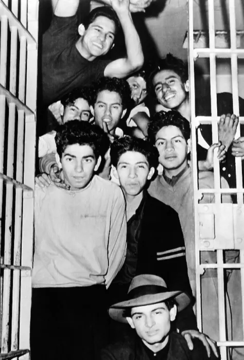 Framed Print : Zoot Suit Riots in Los Angeles. Youthful Zoot Suiters, all packed into a Los Angeles jail cell during the undeclared war between service me and Zoot Suiters. June 8, 1943 Framed Print : Zoot Suit Riots in Los Angeles. Youthful Zoot Suiters, all packed into a Los Angeles jail cell during the undeclared war between service me and Zoot Suiters. June 8, 1943
