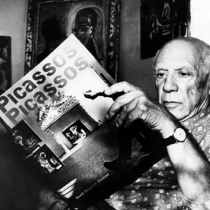 Artist Pablo Picasso reads fom his book at his home on the French Riviera. 10/19/60. Courtesy: CSU Archives/Everett Collection
