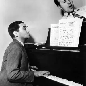 Irving Berlin and Dick Powell, 1937. Courtesy: CSU Archives/Everett Collection
