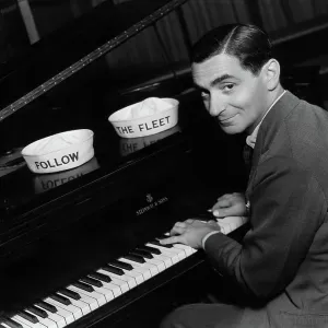 Irving Berlin, at piano, 1936, publicity shot for FOLLOW THE FLEET. Courtesy: CSU Archives / Everett Collection