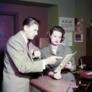 THE KILLERS, from left: Ronald Reagan, Angie Dickinson, on set, 1964