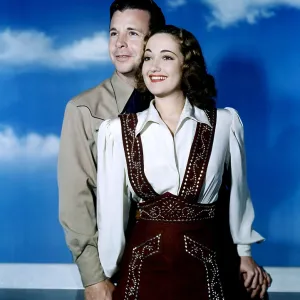 RIDING HIGH, from left, Dick Powell, Dorothy Lamour, 1943