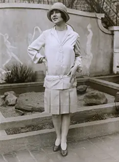Pleated Skirt Prints: 1927 suit with a mid-knee pleated skirt and matching waistless