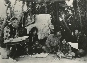 Counting Prints: 1940 Census taker, seated on a barrel
