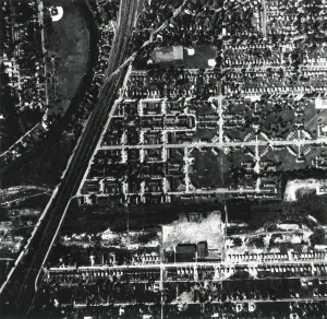 Lcgr1409 Prints: 1956 aerial photograph of Love Canal showing a school and houses built over and near a landfill
