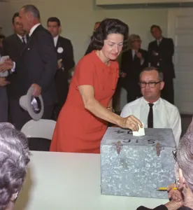 Lady Bird Prints: 1964 Presidential Election. Lady Bird Johnson places her vote in the ballot box at Johnson City