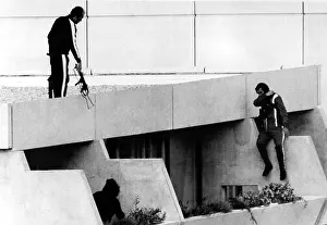 Police Prints: 1972 Olympics, Armed Police drop into position on terrace above apartments where hostages are being held
