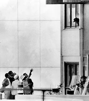 1972 Olympics Prints: 1972 Olympics, Members of Black September (wearing hats) confer outside Israeli Quarters