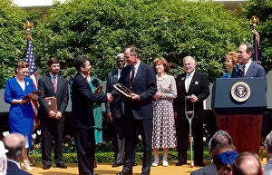 Awards Prints: In a 1990 Rose Garden ceremony, President George H.W